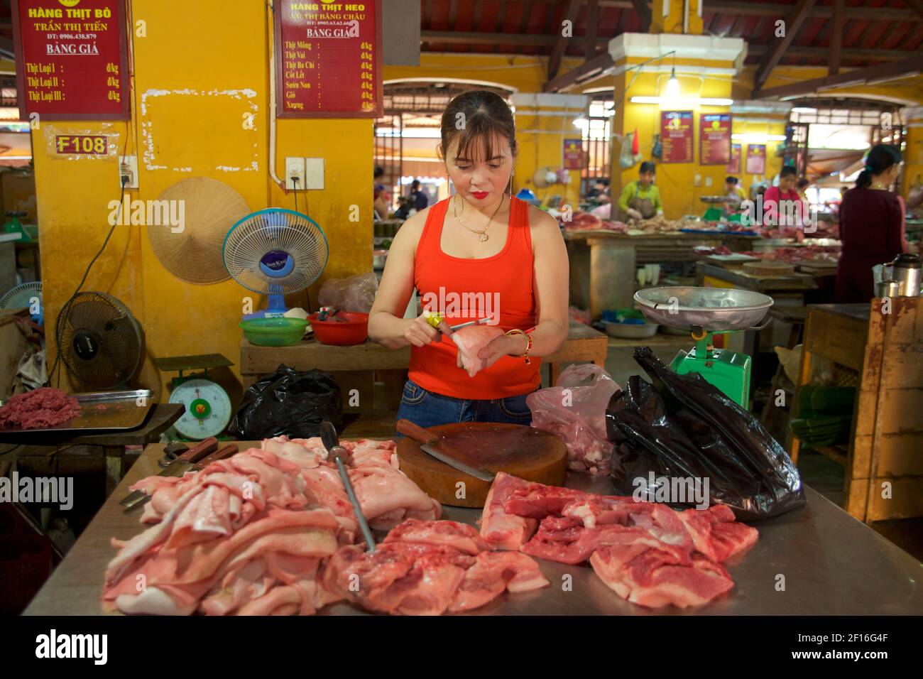 Vietnamese woman selling meat at Hoi An market, Vietnam Stock Photo Alamy