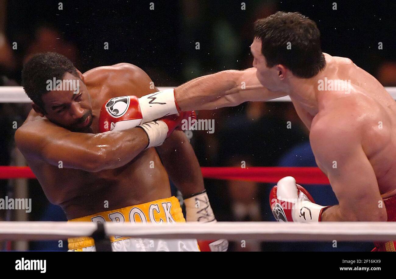 Calvin B Rocks Calvin Brock is hit by a right hand punch by Vladimir Klitschko during ...