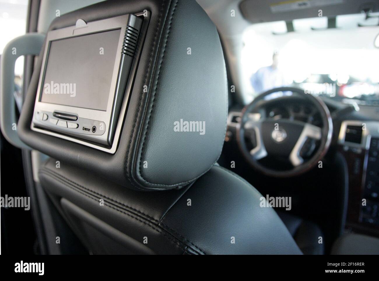 The Cadillac Escalade, a DVD player in the headrest is shown on this