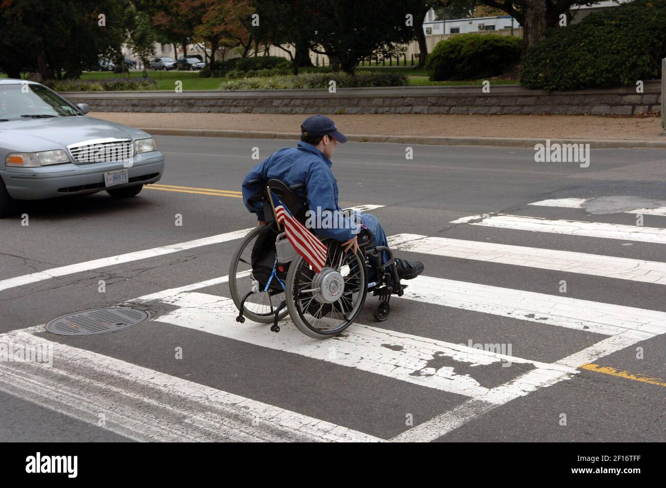 Colin Olenick, a member of a grass-roots lobbying group for the disabled, makes his way across Capitol Hill in Washington, DC, on September 15, 2006. (Photo by Bill Auth/MCT/Sipa USA) Stock Photo