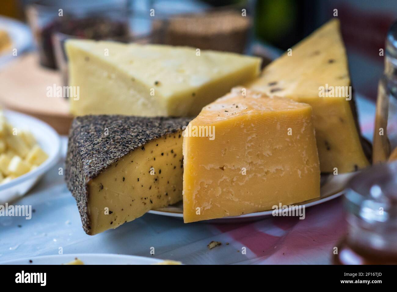 Pieces of hard cheeses Stock Photo