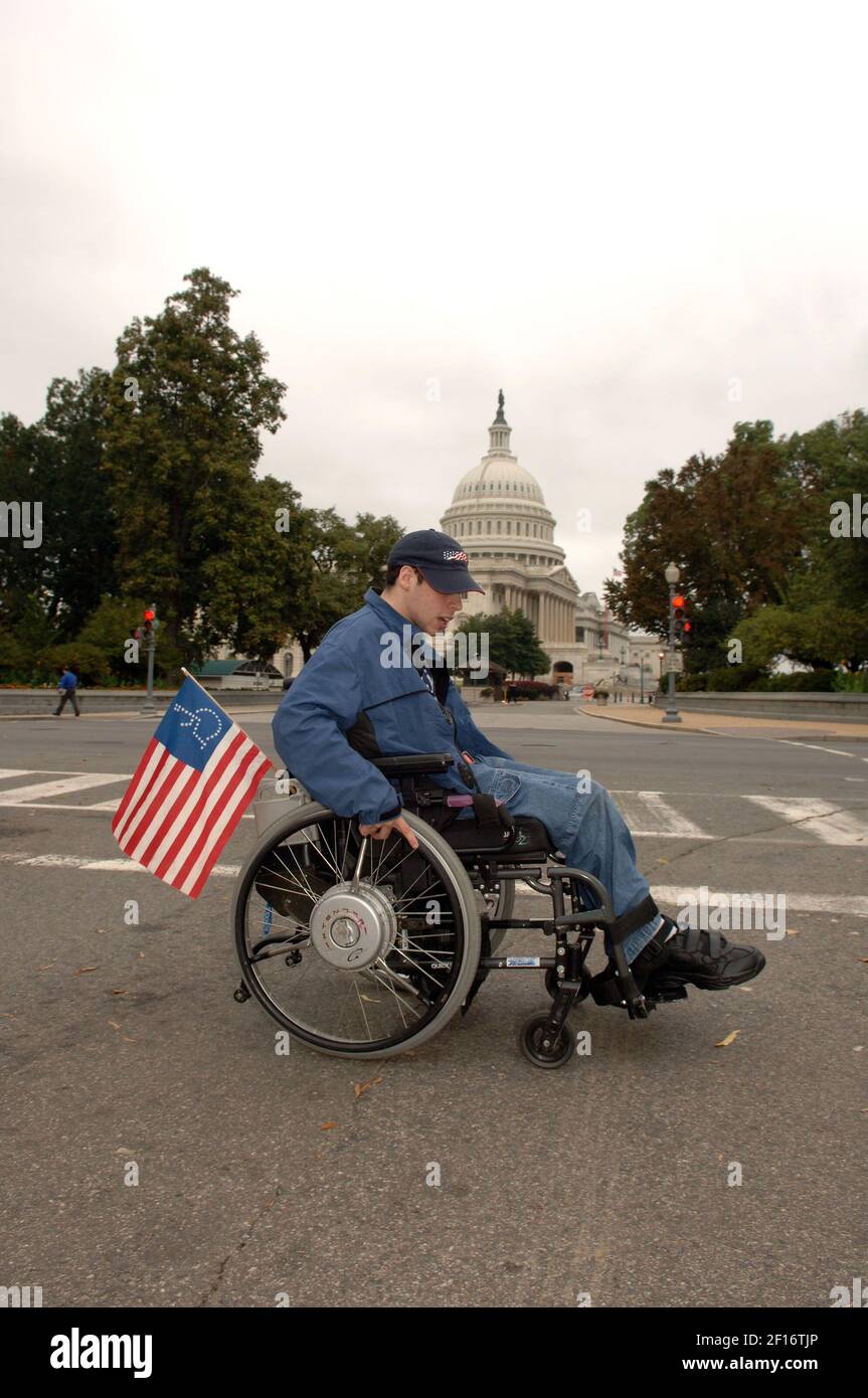 Colin Olenick, a member of a grass-roots lobbying group for the disabled, makes his way across Capitol Hill in Washington, DC, on September 15, 2006. (Photo by Bill Auth/MCT/Sipa USA) Stock Photo