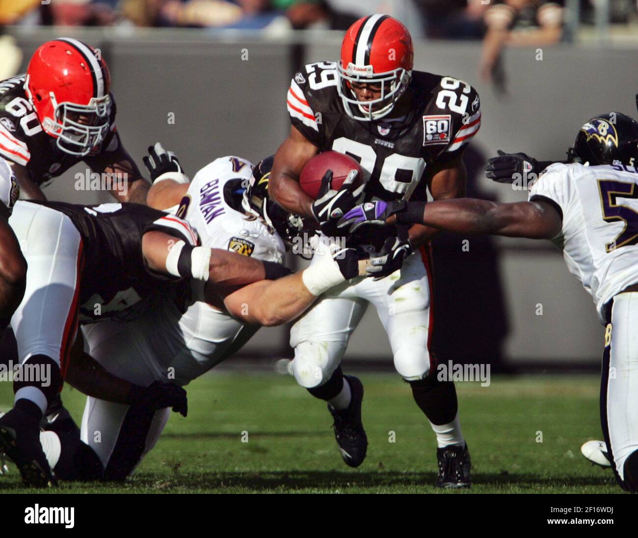 Cleveland Browns' Jason Wright (29) dives to score a touchdown against  Miami Dolphins' Zach Thomas in