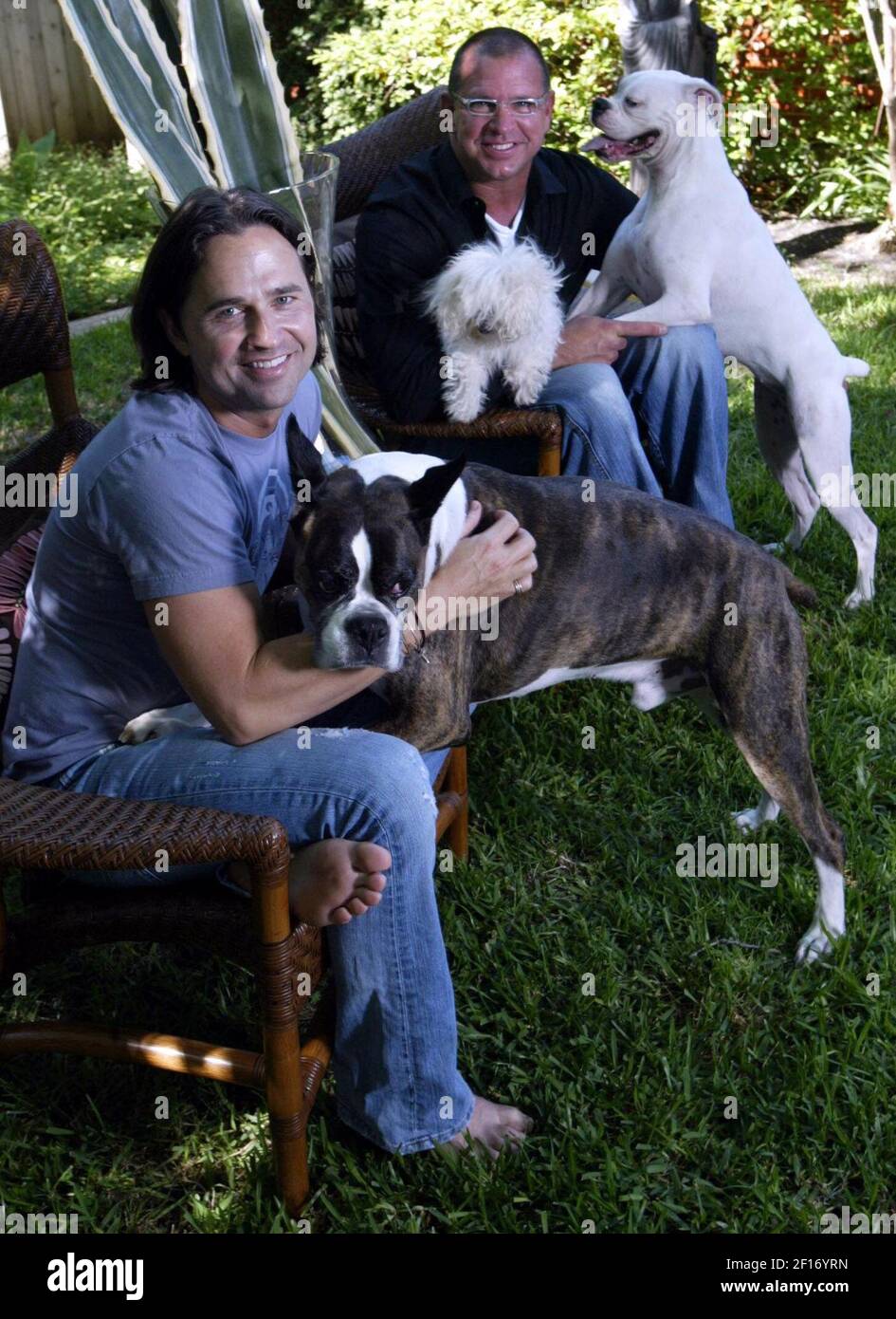 Stylist Greg O'Neal (left) and his dog, Graham, and David Collier holding  Blondie and Ruby the Boxer. (Natalie Caudill/Dallas Morning News/MCT/Sipa  USA Stock Photo - Alamy