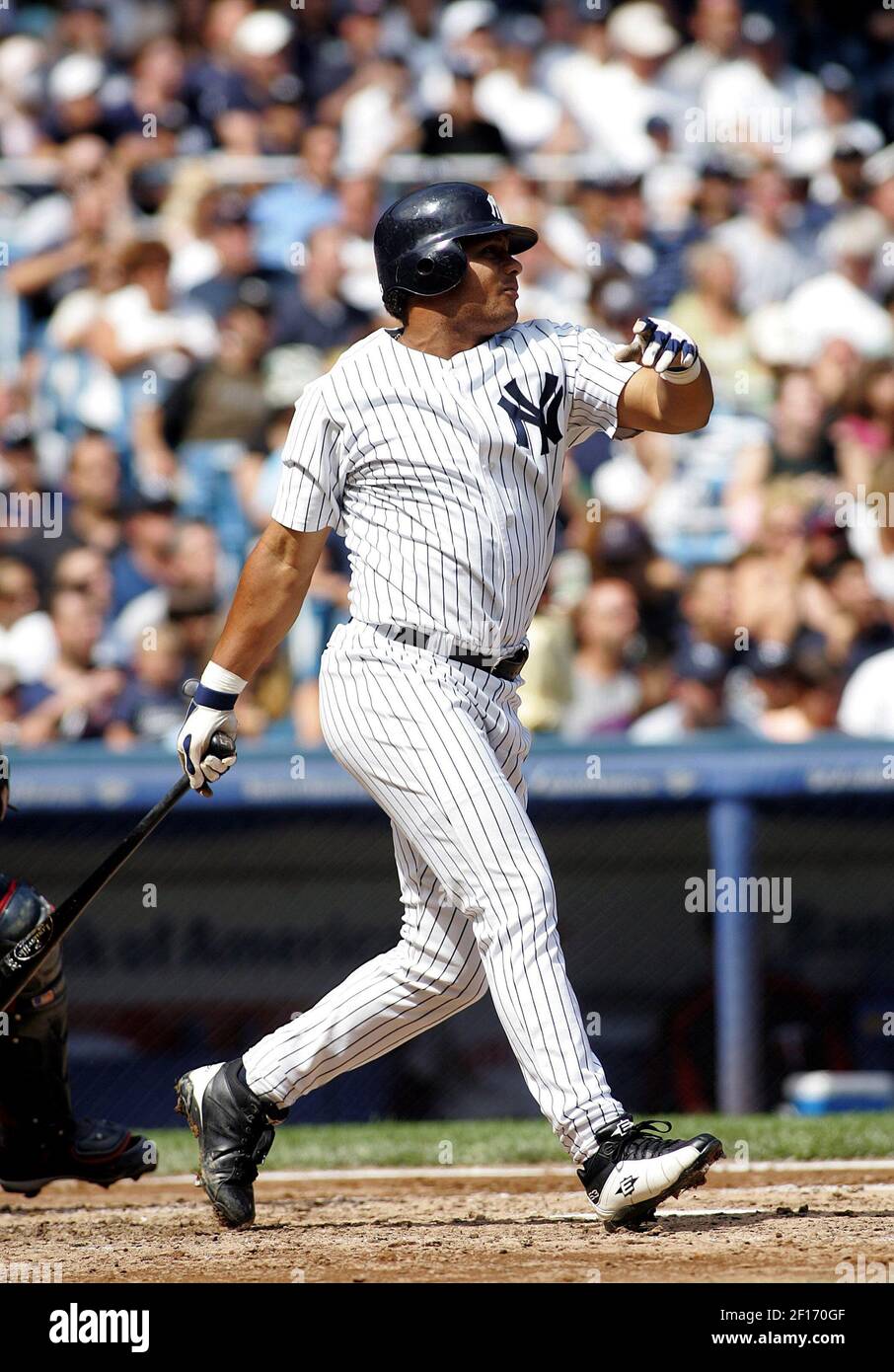 The New York Yankees' Bobby Abreu connects on an RBI double