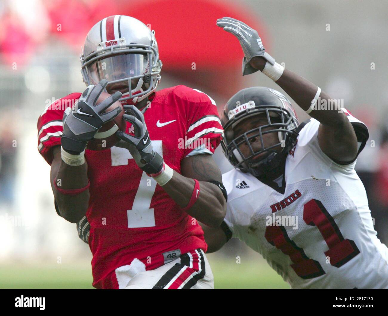 Ohio State receiver Ted Ginn Jr. (7) gets a hug from tight end Rory Nicol  after making a 39-yard touchdown reception during the second quarter at  Ohio Stadium in Columbus, Ohio on