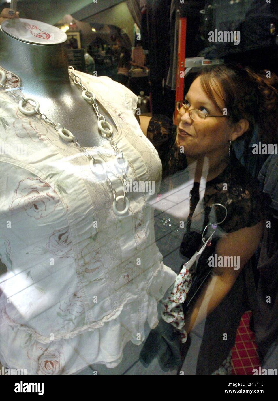 Plus size clothing store hi-res stock 