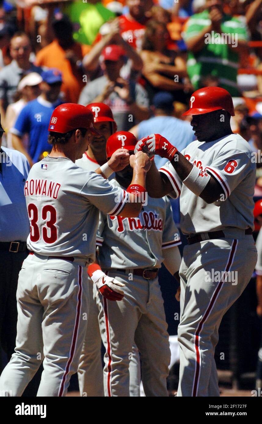 The Philadelphia Phillies Ryan Howard is congratulated by teammate Aaron  Rowand after a three-run home run in the first inning against the New York  Mets on Saturday, August 5, 2006. (Photo by