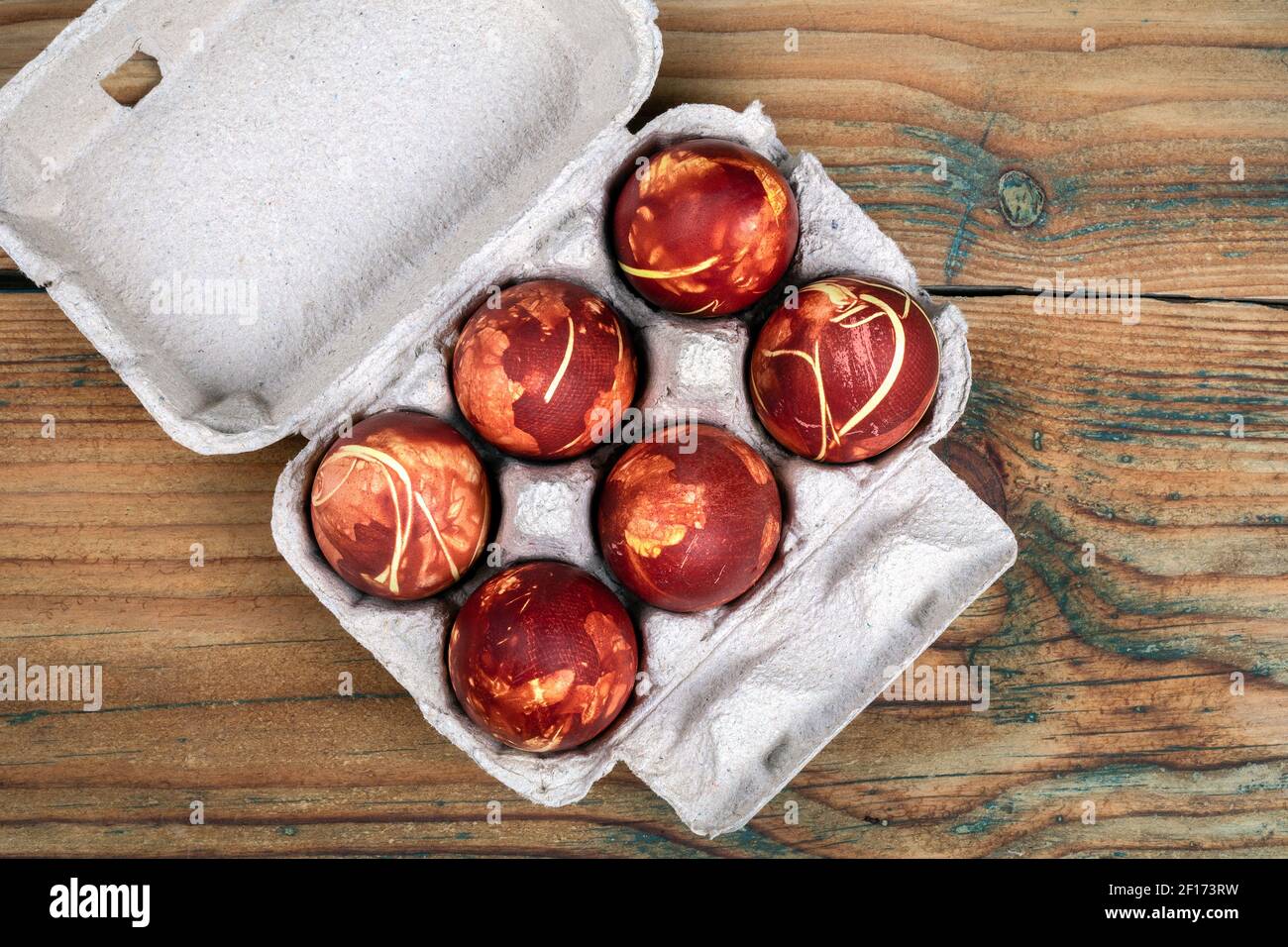 Coloured Easter eggs in onion skin, materials of nature for egg