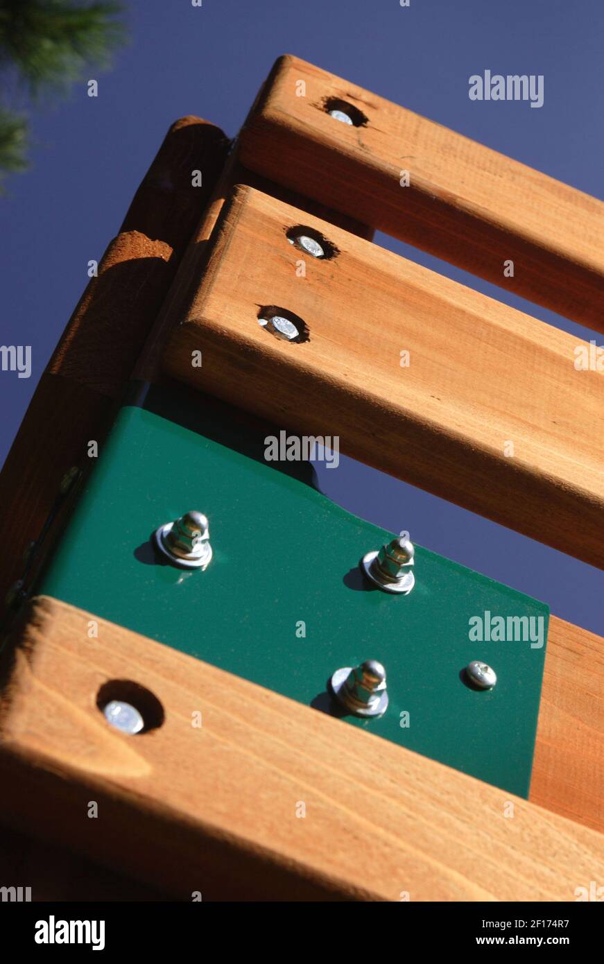 When looking for a wooden play set make sure that major joints are reinforced with metal brackets and all bolts have rounded tops or are recessed into the wood. (Photo by Chas Metivier/Orange County Register/KRT) Stock Photo