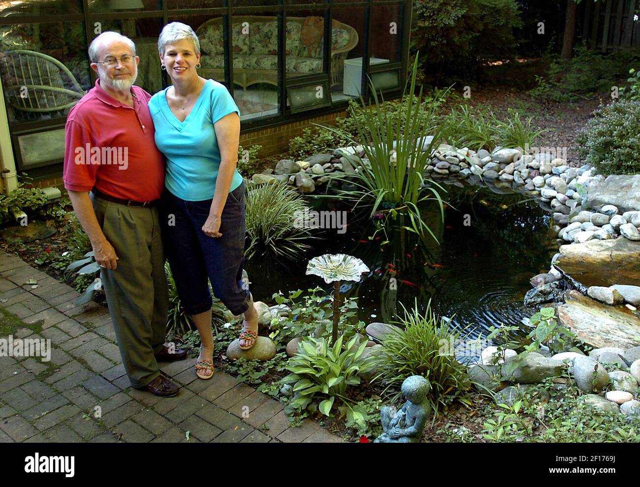 Ollie Frazier, left, and wife Penny have made a lovely cascading