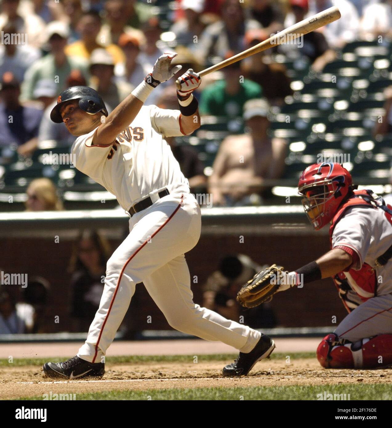 Randy Winn of the San Francisco Giants cracks a double to drive in a ...