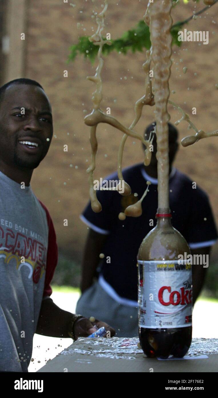 Chris Henderson watches the reaction of dropping Mentos mints into a 2