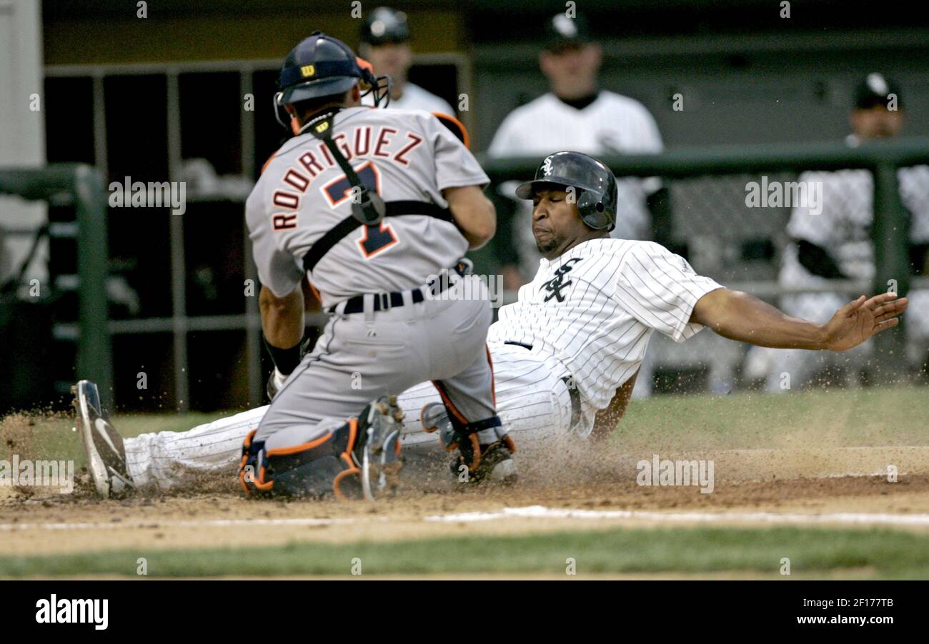 Chicago Cubs' DJ LeMahieu and Chicago White Sox' AJ Pierzynski watch as  Alex Rios is doubled up to end the 4th inning at US Cellular Field in  Chicago, Illinois, on Monday, June