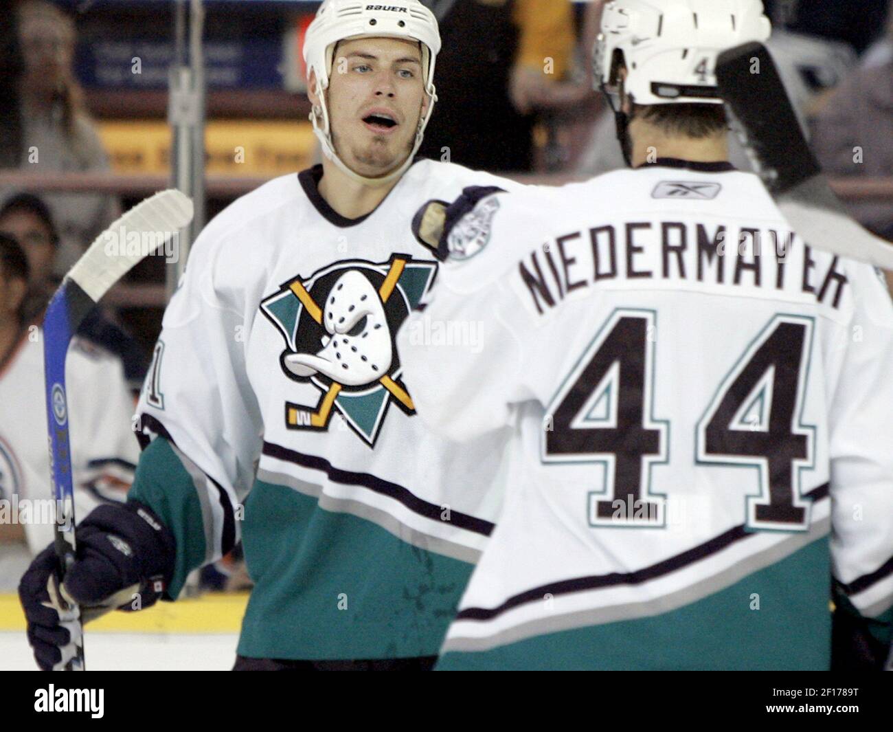 Anaheim Mighty Ducks' center Ryan Getzlaf, left, celebrates