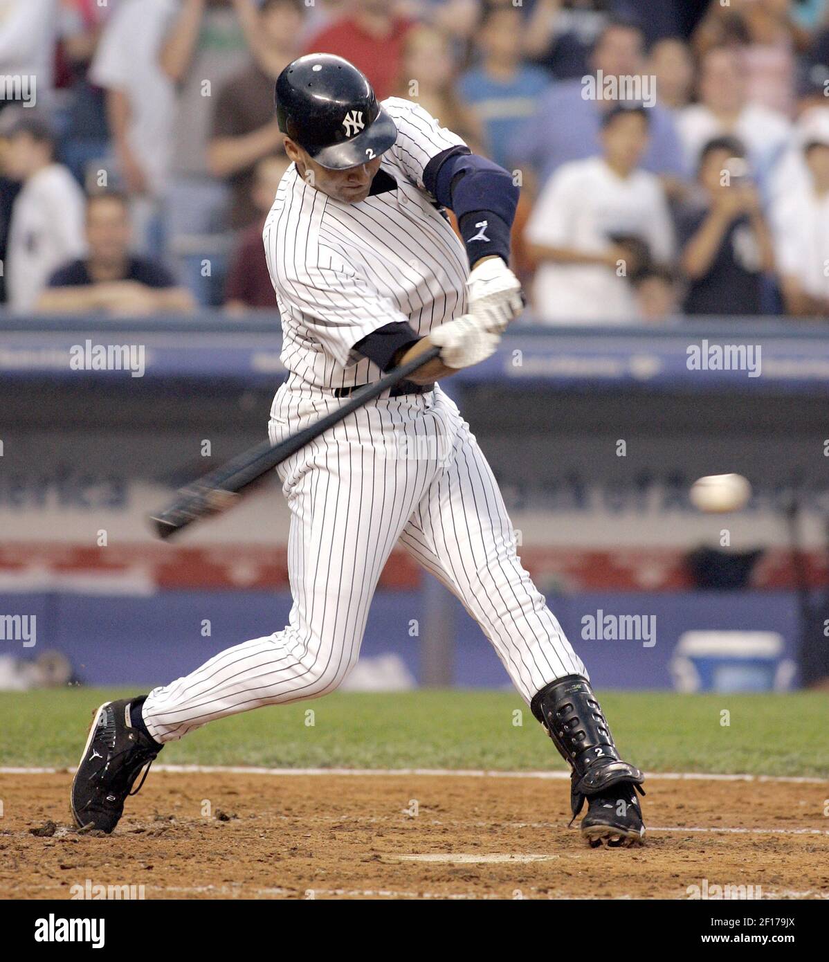 New York Yankees' Derek Jeter hits a single in the fourth inning for his  2000th hit as the Kansas City Royals played the NY Yankees at Yankee  Stadium in Bronx, New York
