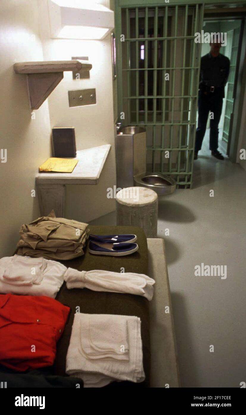 Federal corrections officer william brown stands in the doorway of a
