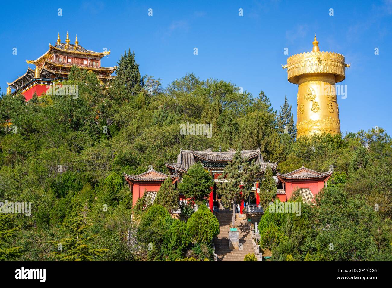 Guishan Dafo temple scenic view with the giant Tibetan Buddhist prayer wheel in Guishan park in Dukezong old town in Shangri-La Yunnan China Stock Photo