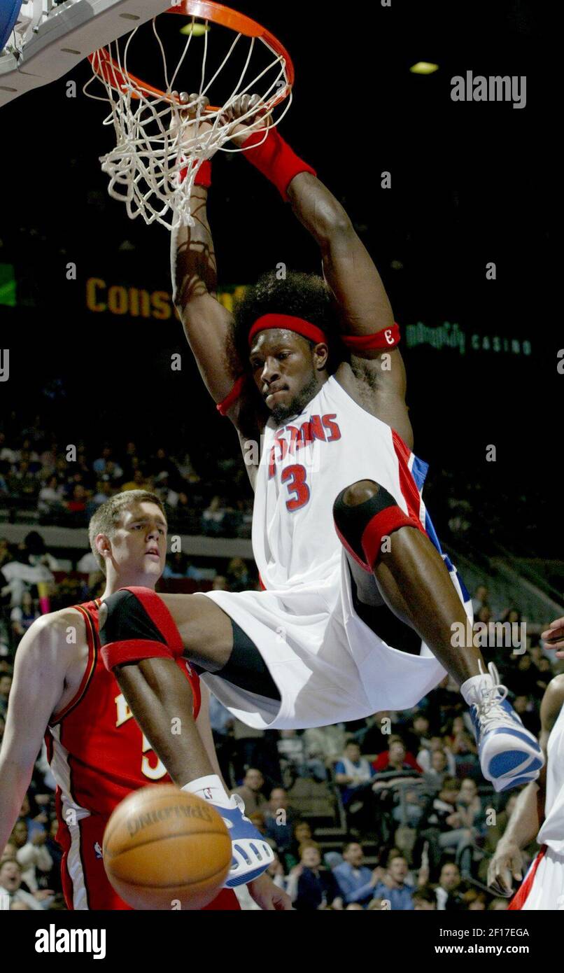 Detroit Pistons Ben Wallace Slam Dunks Against Atlanta Hawks John Edwards In The First Half During The Pistons 91 84 Win Over The Hawks At The Palace Of Auburn Hills In Auburn Hills