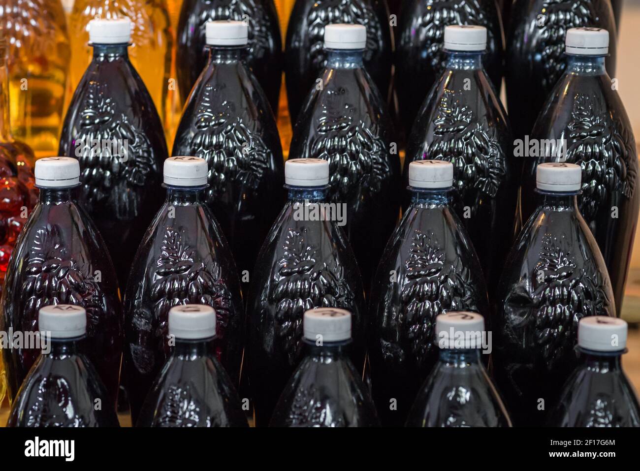 Plastic bottles filled with wine Stock Photo Alamy