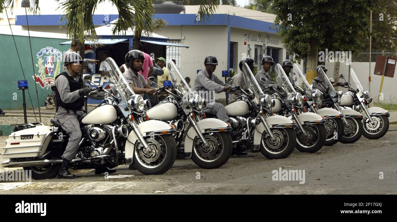 Police officers in Santo Domingo in the Dominican Republic ride Harley