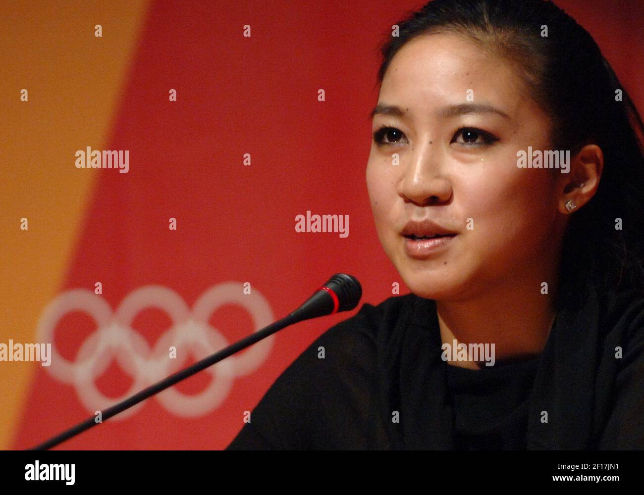 U.S. figure skater Michelle Kwan speaks about her decision to withdraw from competition in the 2006 Winter games during a press conference in Turin, Italy on Sunday, February 12, 2006. (Photo by Steve Deslich/KRT) Stock Photo