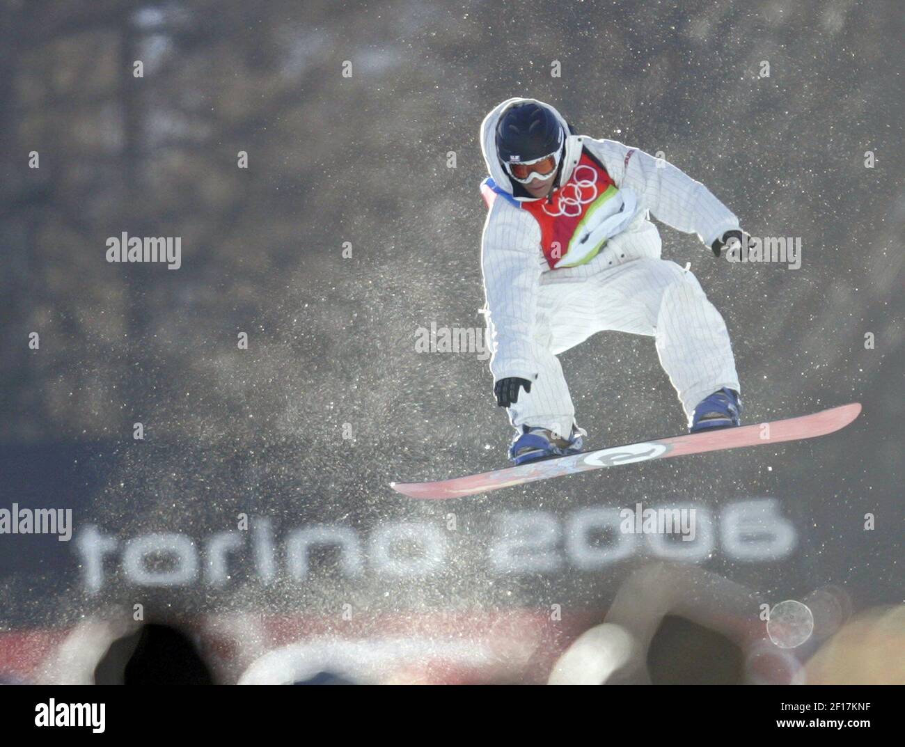 USA's Andy Finch catches air on his first qualification run during the Men's Halfpipe snowboard competition in Bardonecchia on Sunday, February 12, 2006 during the 2006 Winter Games. (Photo by Joe Rimkus Jr./Miami Herald/KRT) Stock Photo