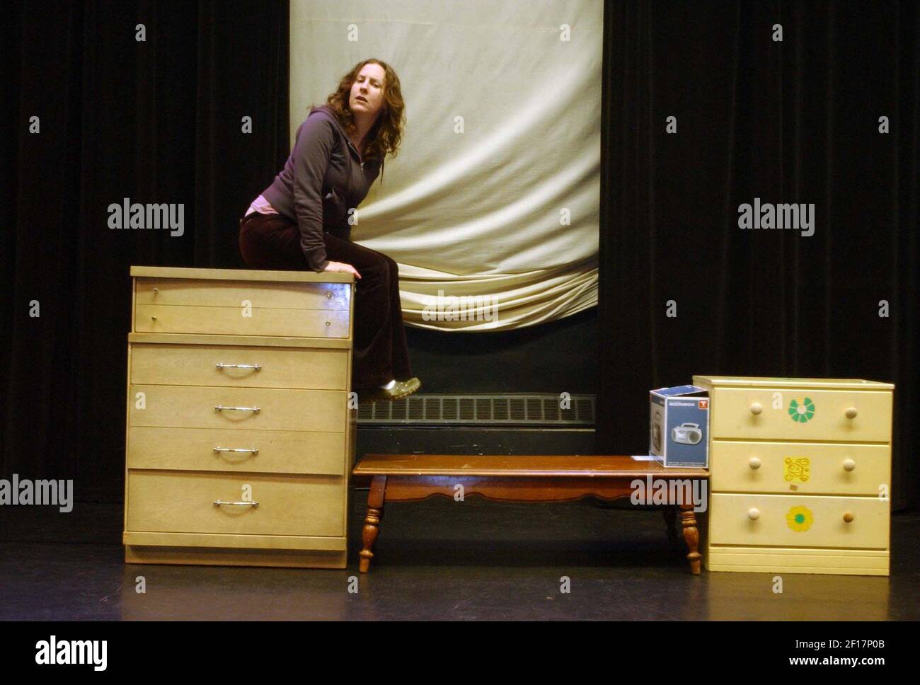 Actress Maria Moller rehearses a scene March 24, 2006, from a play she has written called "House