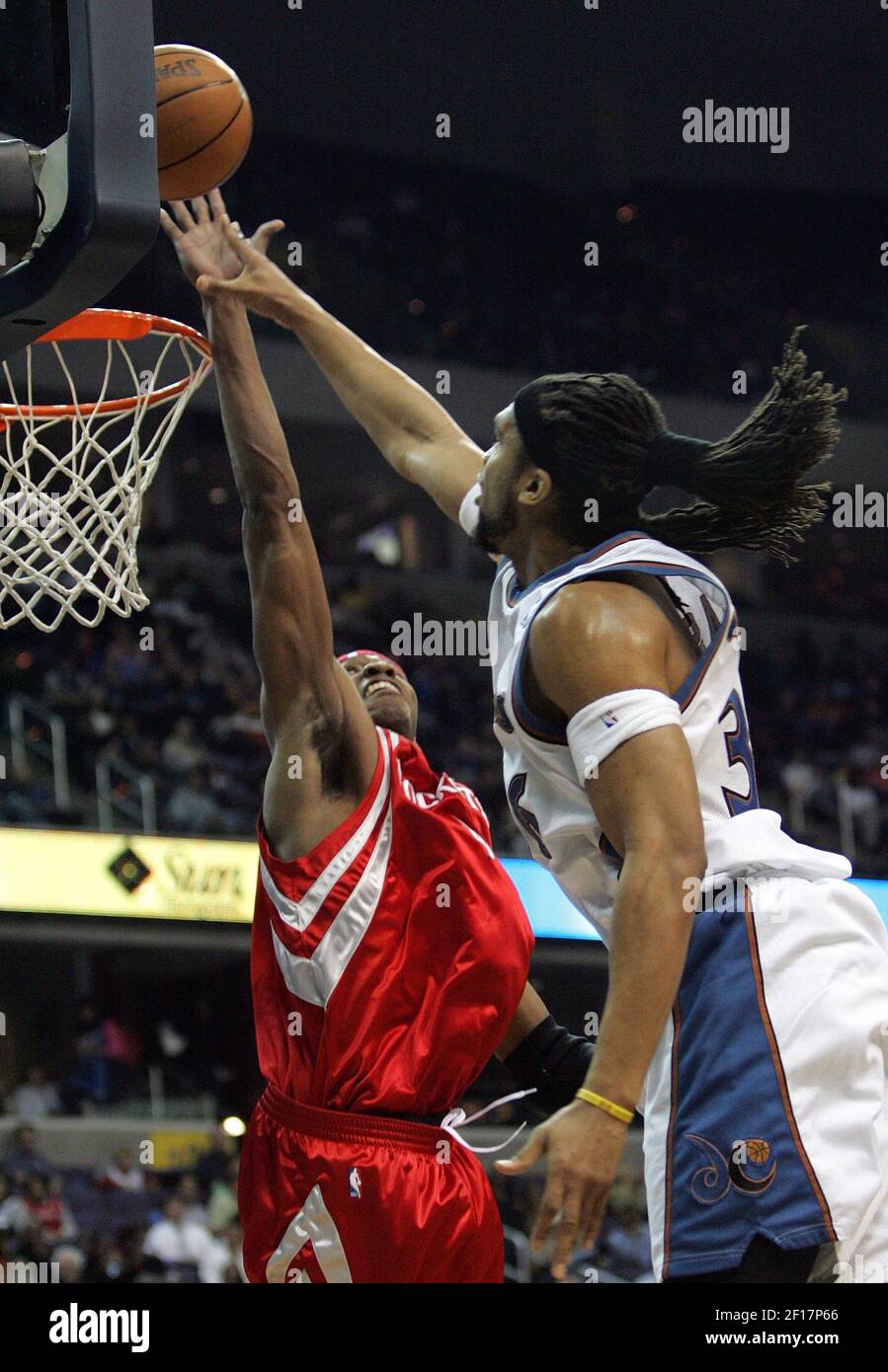 Houston Rockets Stromile Swift (4) blocks the shot attempt of ...