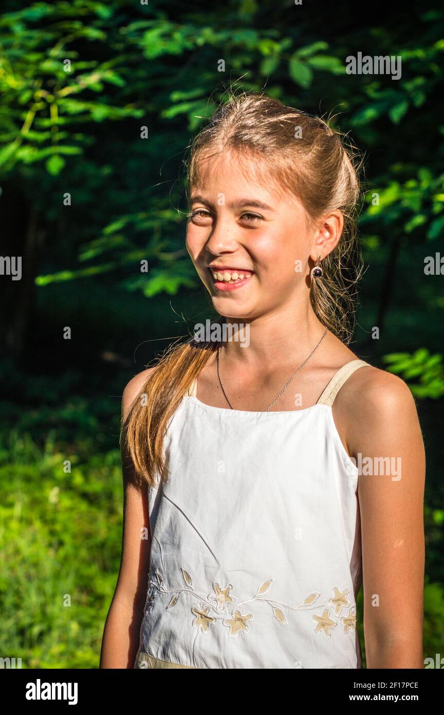 Portrait of beautiful girl in the Park Stock Photo - Alamy