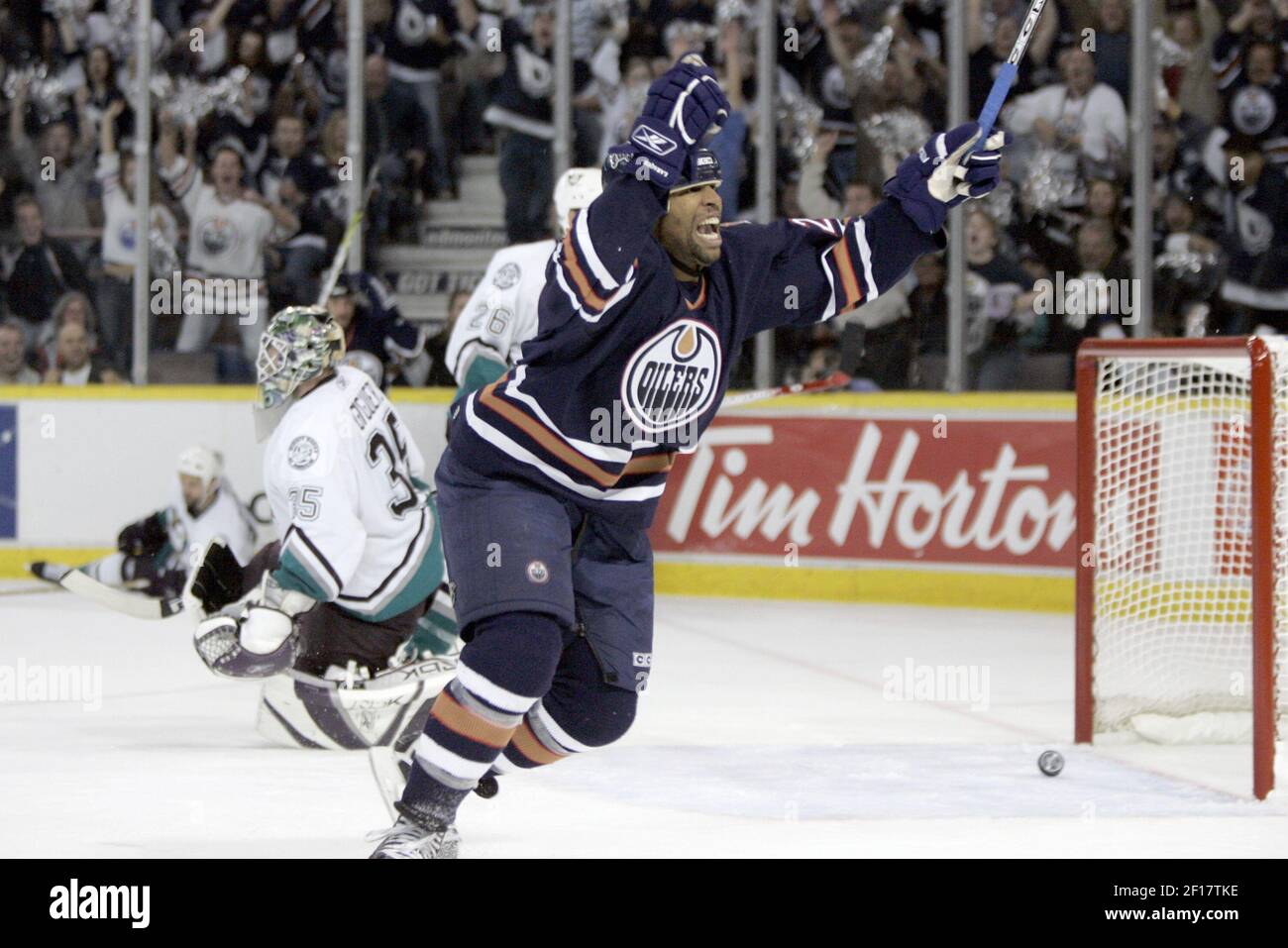 Edmonton Oilers' wing Georges Laraque falls when he can't get his