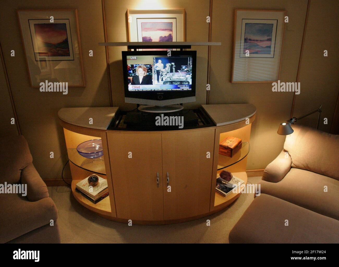 A popup television from within a solves space problems in a bedroom in Bath Township