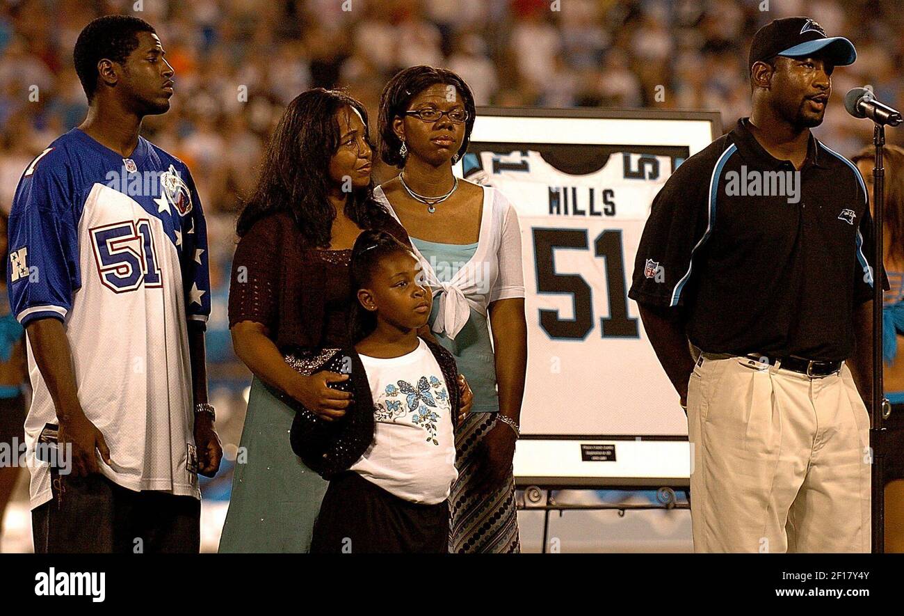 KRT SPORTS STORY SLUGGED: FBN-REDSKINS-PANTHERS KRT PHOTOGRAPH BY PATRICK  SCHNEIDER/CHARLOTTE OBSERVER (August 13) CHARLOTTE, NC -- Sam Mills III  speaks for the family at a ceremony retiring the jersey of Carolina Panthers