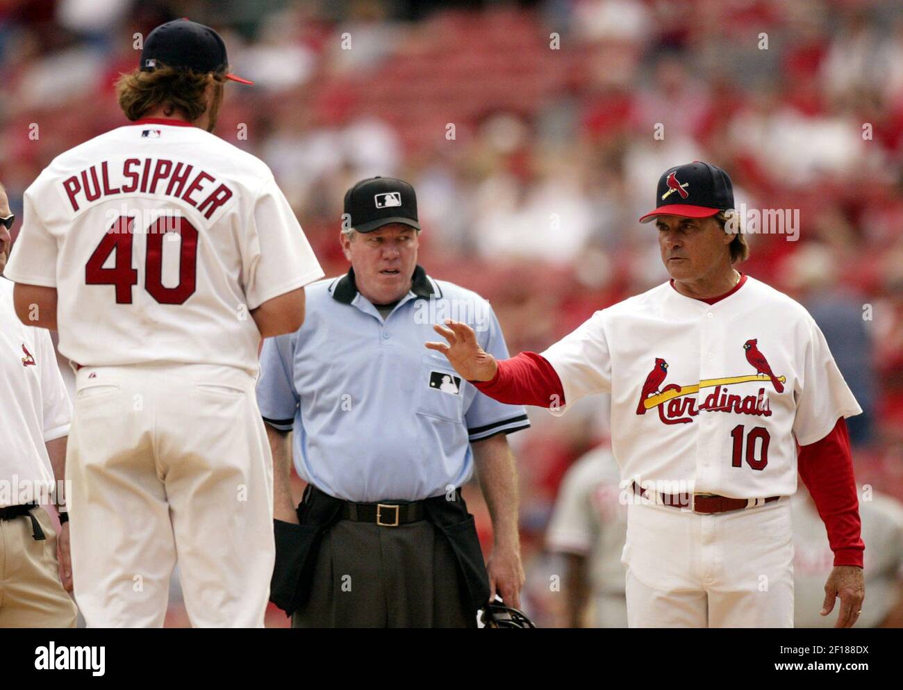 St. Louis Cardinals' shortstop David Eckstein turns a double play over the  Washington Nationals' Austin Kearns to end the sixth inning of their game  on Friday, August 3, 2007, at RFK Stadium