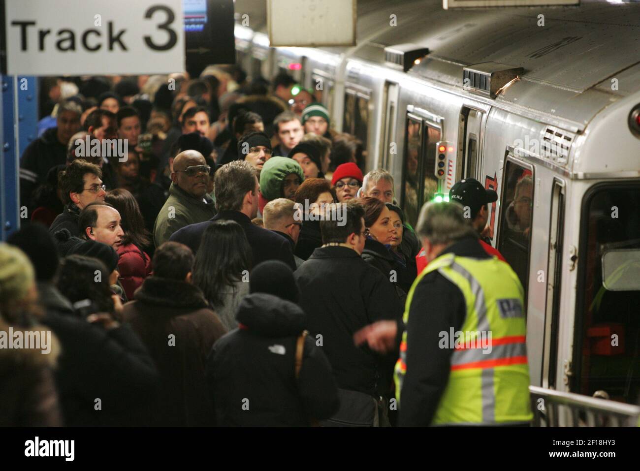 Commuters converge on the Port Authority Trans-Hudson (PATH) station at ...