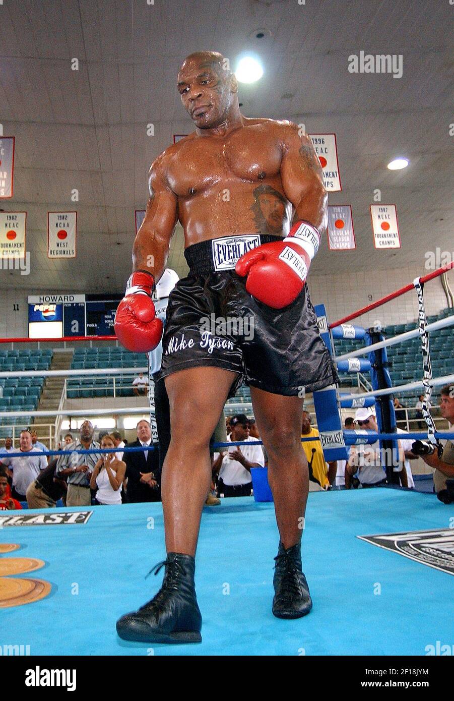KRT SPORTS STORY SLUGGED: BOX-TYSON KRT PHOTOGRAPH BY OLIVIER  DOULIERY/ABACA PRESS (June 8) Boxer Mike Tyson walks in the ring as he  trains at Howard University in Washington, D.C. on Tuesday, June