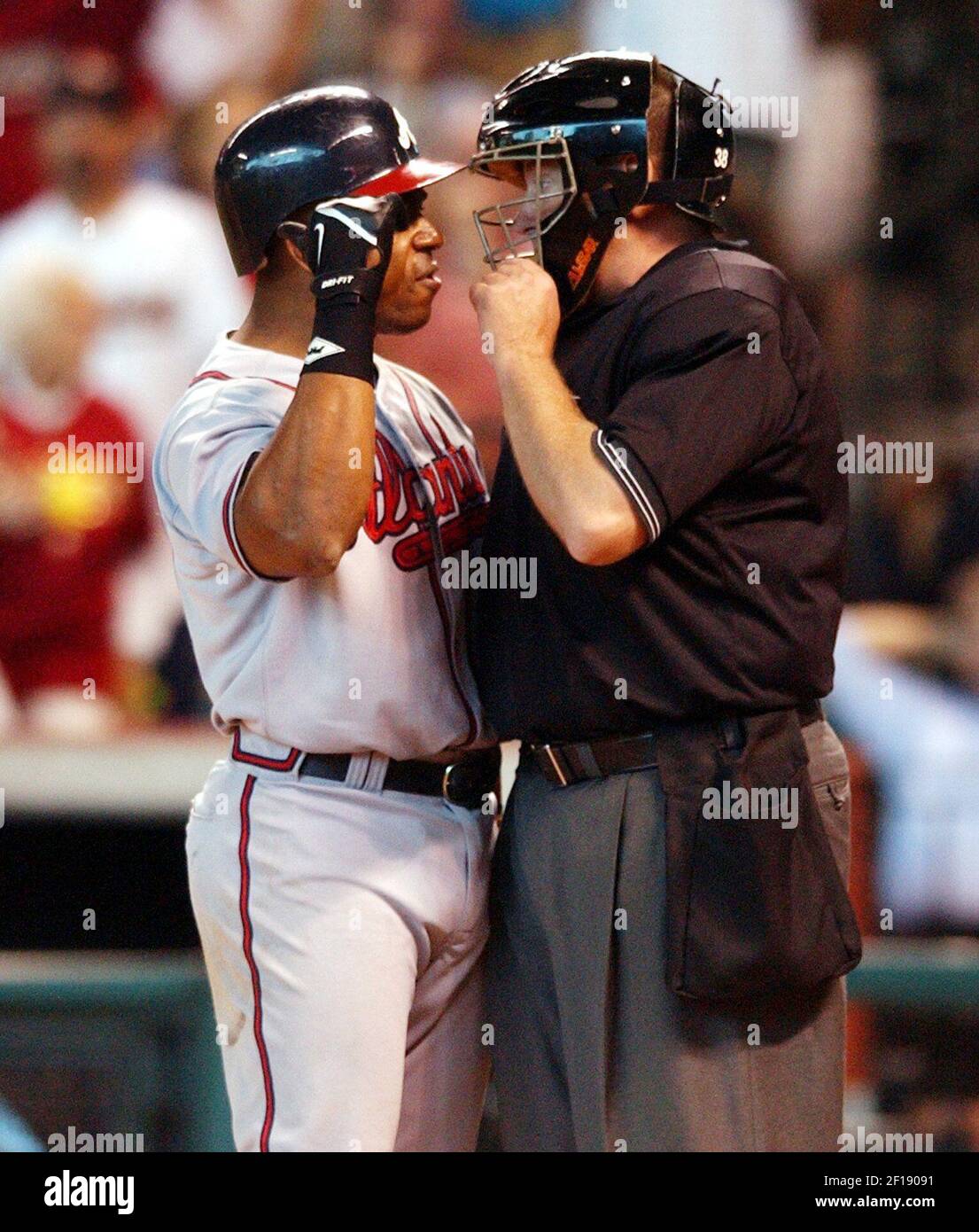 St. Louis, United States. 16th Aug, 2014. St. Louis Cardinals broadcaster Mike  Shannon shown as he is helped by Bob Gibson with his St. Louis Cardinals  Hall of Fame red jacket during