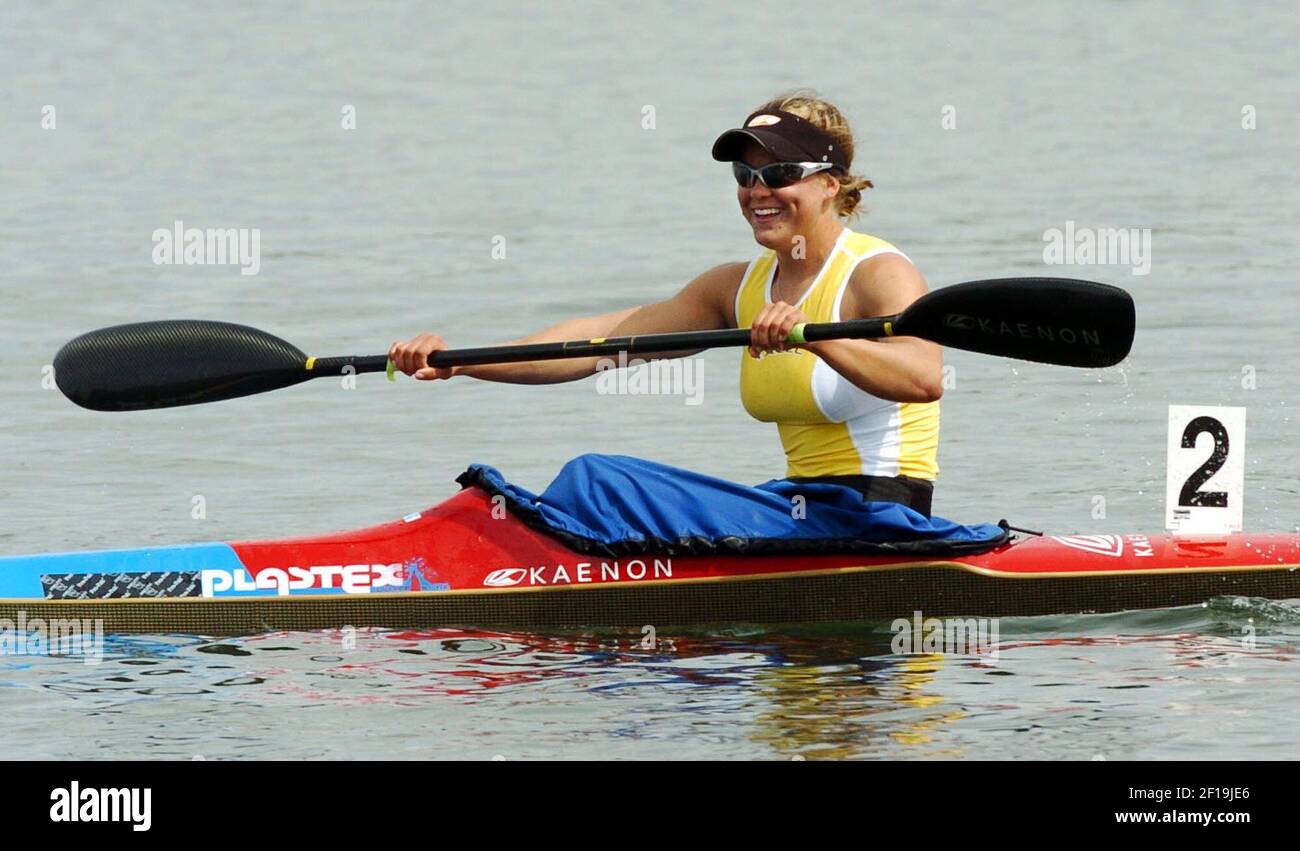 KRT SPORTS STORY SLUGGED: OLY-CANOEKAYAKTRIALS KRT PHOTOGRAPH BY KARL  MONDON/CONTRA COSTA TIMES (April 15) OAKLAND, CA -- Carrie Johnson is all  smiles after placing first at the U.S. Olympic Team Trials for