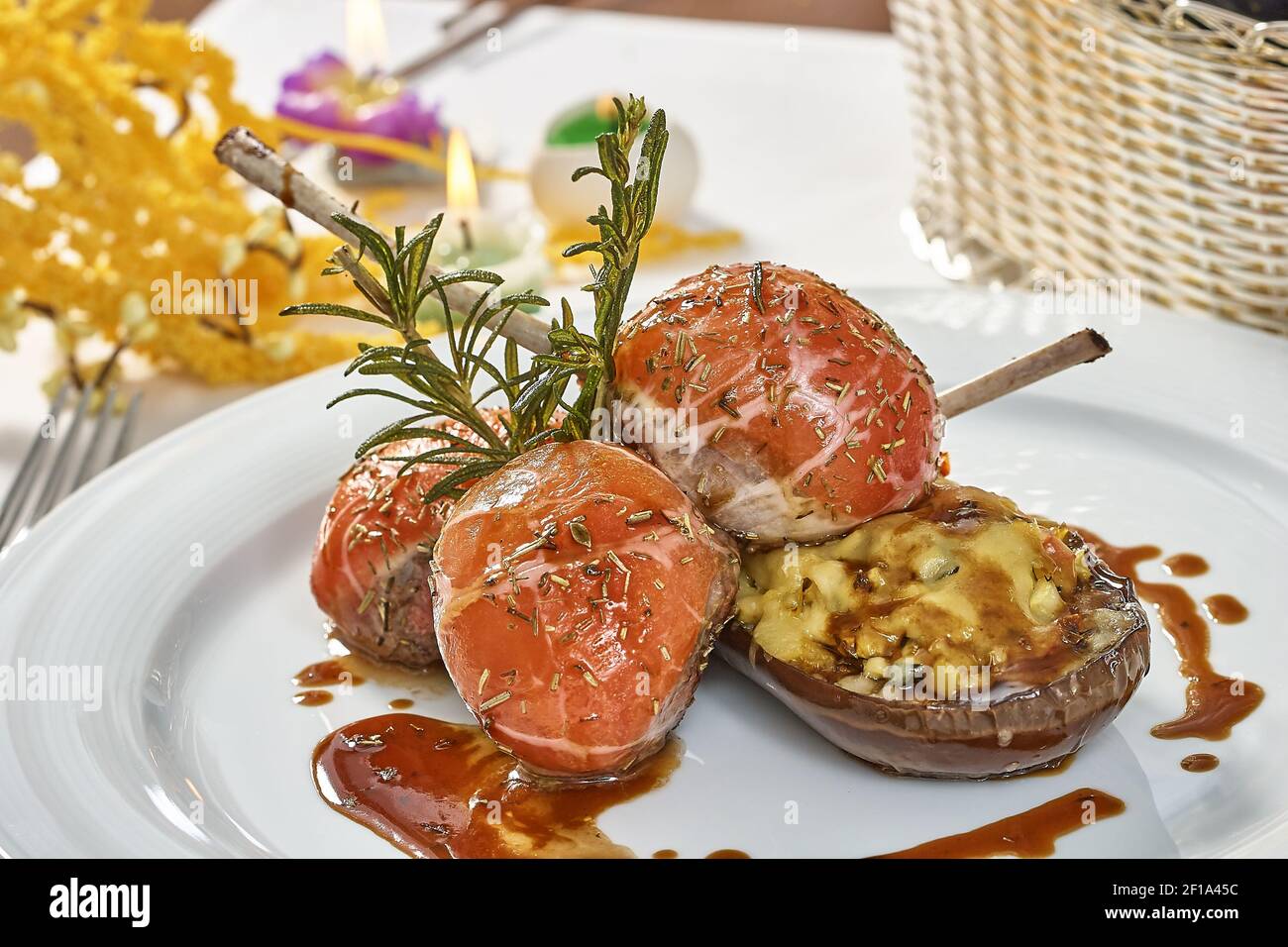 Image of lamb chops on a bed of vegetables Eggplant stuffed with vegetables Stock Photo Alamy