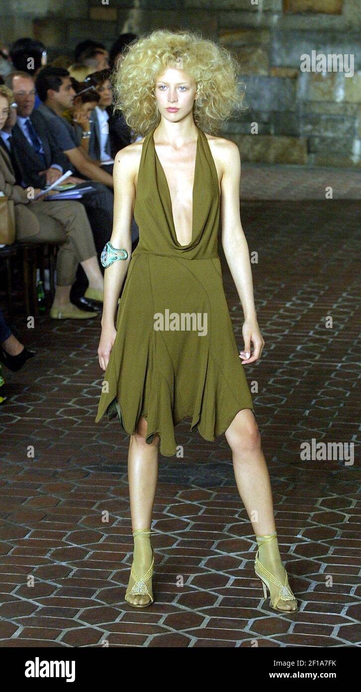 KRT FASHION STORY SLUGGED: NYFASHION-MALANDRINO KRT PHOTOGRAPH BY TODD PLITT/KRT (September 19) NEW YORK, NY - A model walks the runway wearing a cowl neck chiffon dress during the Catherine Malandrino Spring KRT FASHION STORY SLUGGED: NYFASHION-MALANDRINO KRT PHOTOGRAPH BY TODD PLITT/KRT (September 19) NEW YORK, NY - A model walks the runway wearing a cowl neck chiffon dress during the Catherine Malandrino Spring