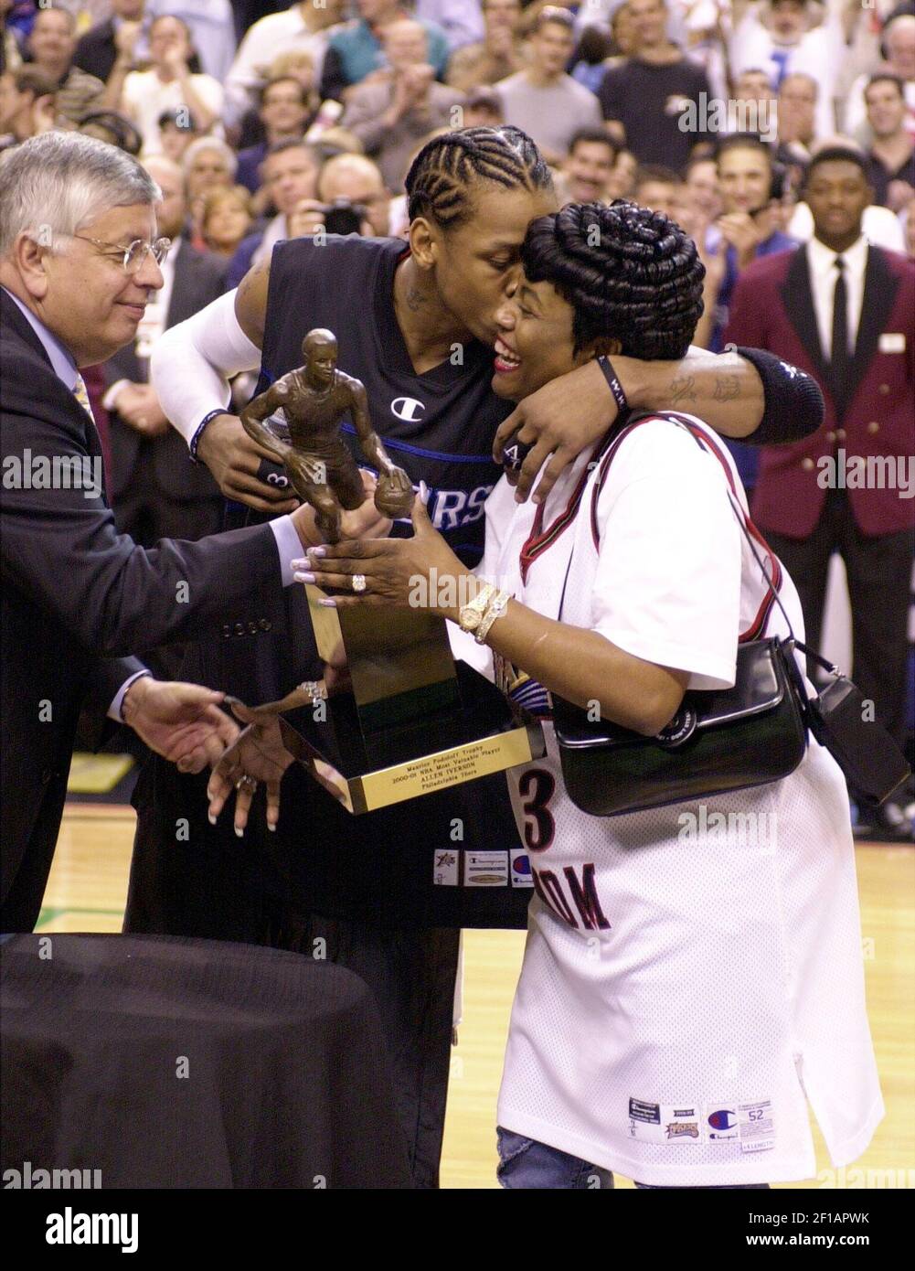 KRT SPORTS STORY SLUGGED: RAPTORS-SIXERS KRT PHOTOGRAPH BY CHARLES  FOX/PHILADELPHIA INQUIRER (May 16) PHILADELPHIA, PA -- Allen Iverson kisses  his mother as NBA commissioner David Stern presents Iverson with the League  MVP