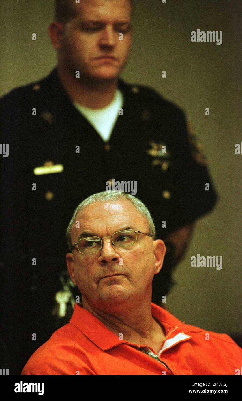 KRT US NEWS STORY SLUGGED: RABBI KRT PHOTOGRAPH BY ELIZABETH V. ROBERTSON/PHILADELPHIA INQUIRER (KRT12) CAMDEN, NJ., September 10 -- Flanked by a sherriff officer, Rabbi Fred J. Neulander is arraigned in Camden County Court on Thursday September 10, 1998, for arranging the murder of his wife. Neulander was charged with accomplice murder and conspiracy to commit murder for the 1994 slaying of his wife, Carol, who was found beaten to death on the couple's living room floor. (Photo by PH) AP PL KD RTR BL 1998 (Vert) (Additional photos available on KRT Direct, PressLink or upon request.) Stock Photo