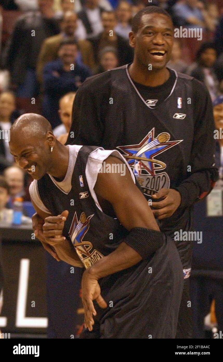 KRT SPORTS STORY SLUGGED: ALLSTARS KRT PHOTO BY RON CORTES/PHILADELPHIA  INQUIRER (February 10) All-Star Game MVP and West All-Star Kobe Bryant  tries to dribble through Ray Allen, top, and Tracy McGrady during