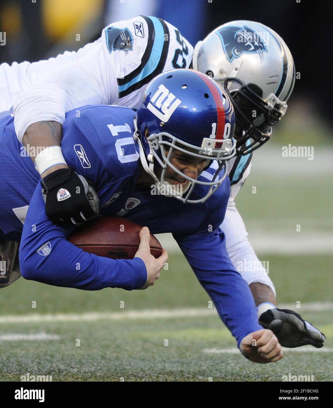 New York Giants quarterback Eli Manning releases a pass in the second  quarter against the Dallas Cowboys at Giants Stadium in East Rutherford,  New Jersey on November 11, 2007. (UPI Photo/John Angelillo