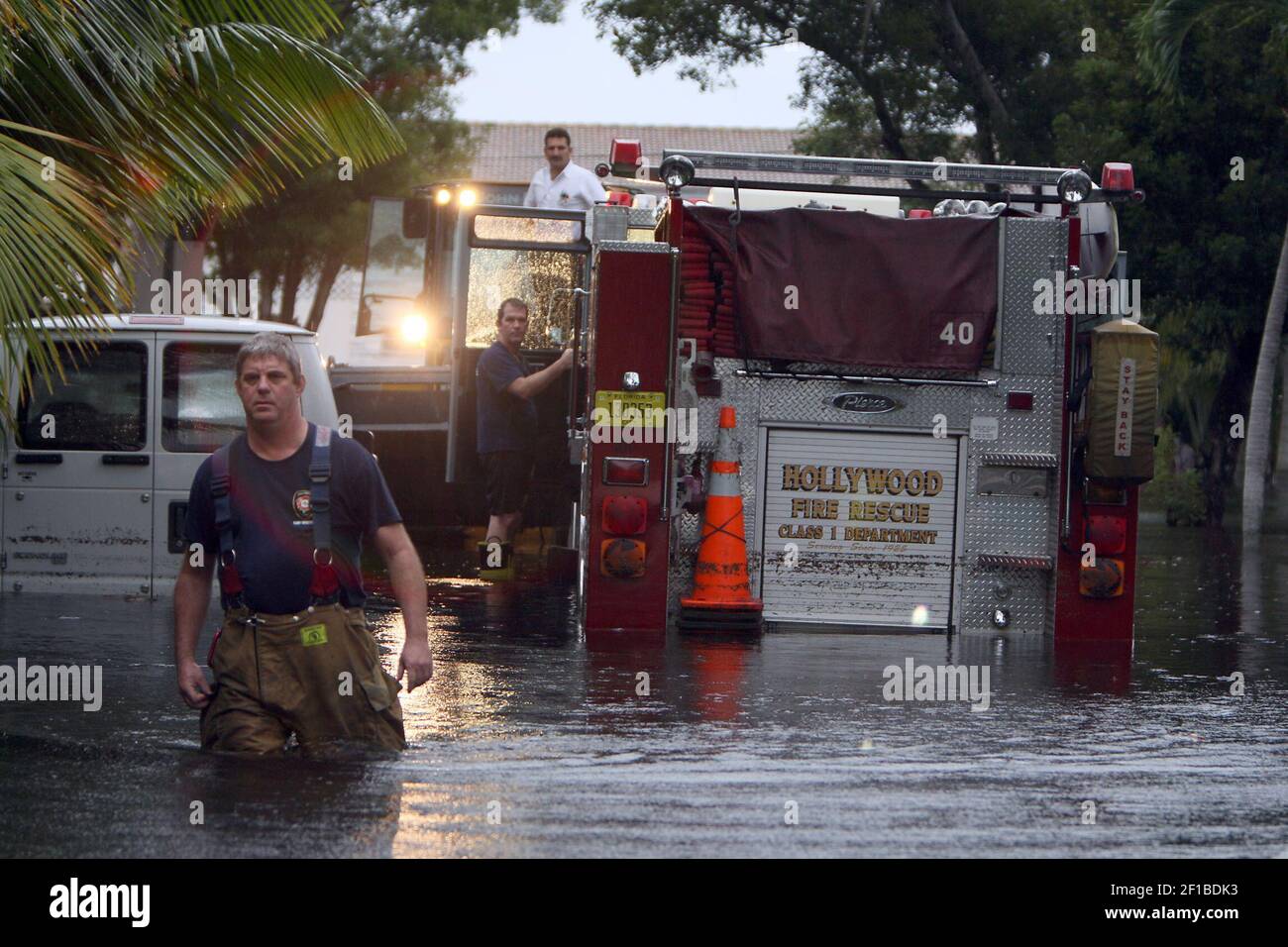 Hollywood (Florida) Fire Rescue Engine 40 was still stalled in water Friday  morning, December 18, 2009, after responding to calls the night before in  heavy rains and flooding. Homes were flooded and