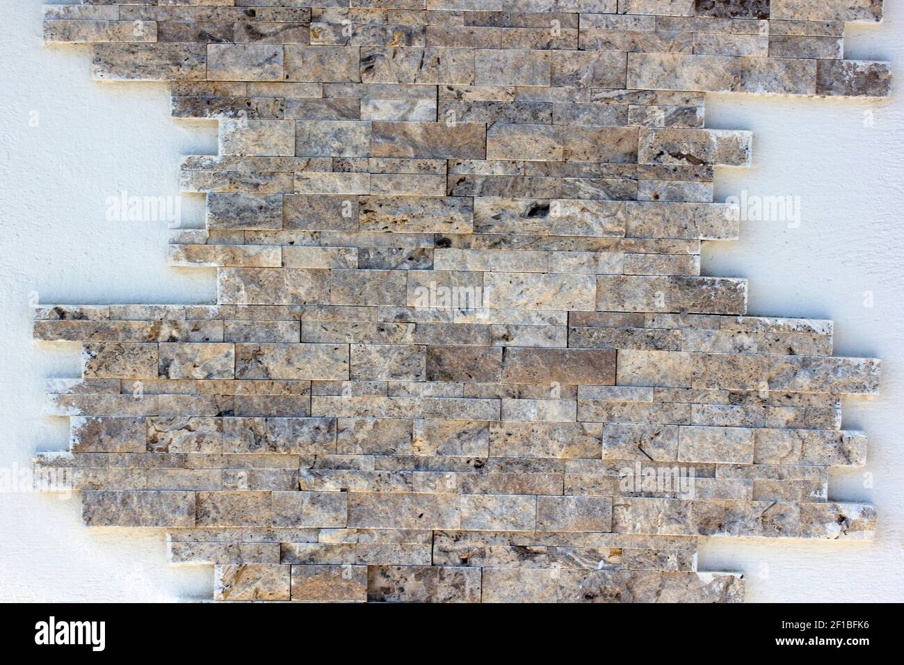 Decorative stone garden wall texture background Stock Photo - Alamy