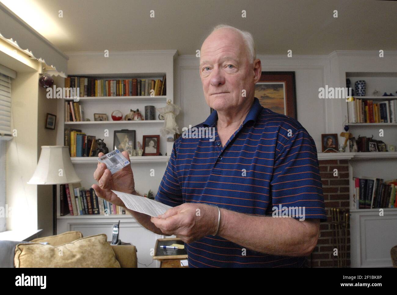 Brown of Moorestown, New Jersey, holds the letter from Chase