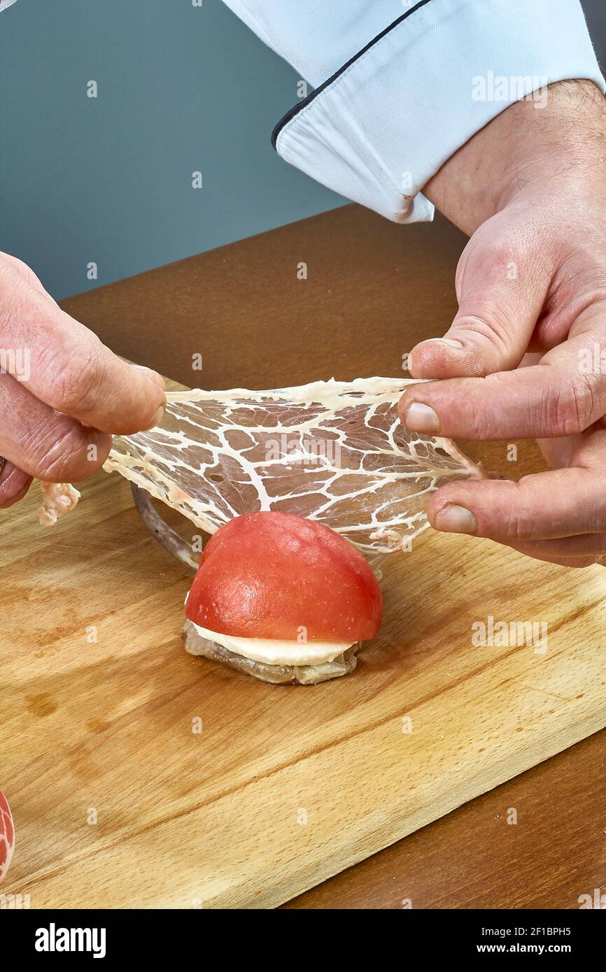 Cook prepares lamb ribs cooking process Stock Photo Alamy