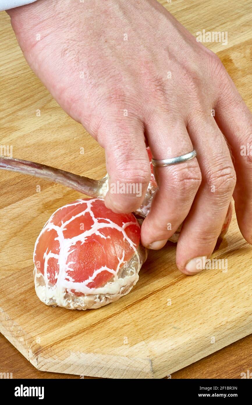 Cook prepares lamb ribs cooking process Stock Photo Alamy