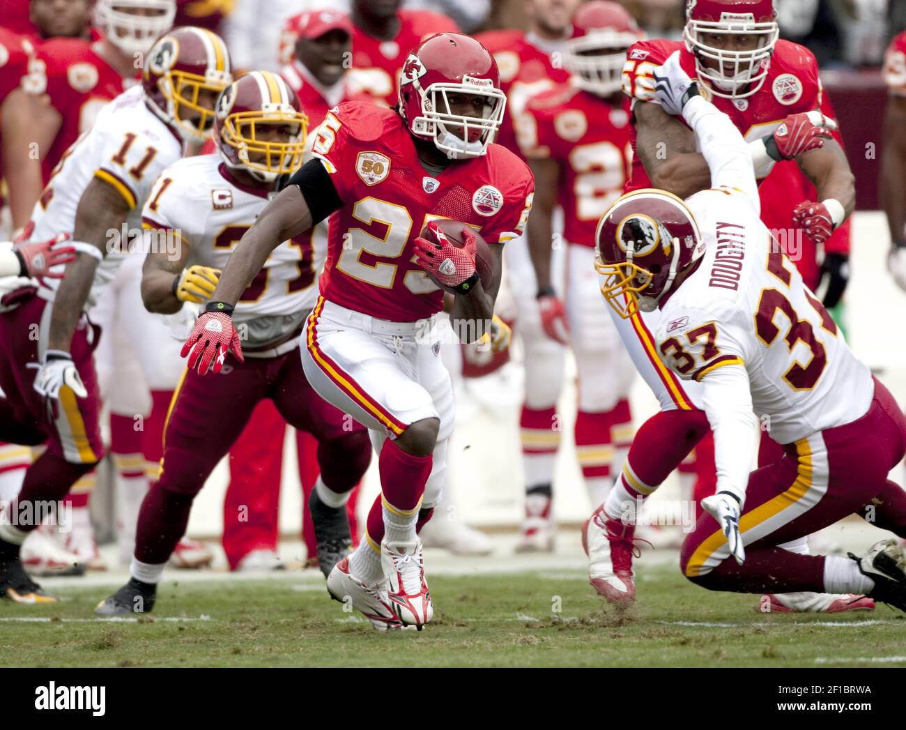 Kansas City Chiefs wide receiver Dwayne Bowe (82) carries the ball during  the first half of an NFL football game against the Miami Dolphins, Sunday,  Sept. 21, 2014, in Miami Gardens, Fla. (